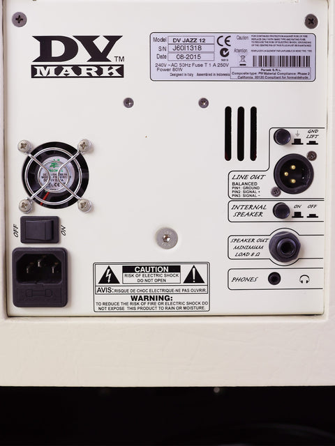 Rear side of a white DV Mark Jazz 12 Combo amplifier, displaying a label, highlighting its modern look and 80-watt output.