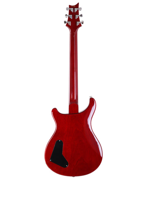 Red PRS Custom 22 electric guitar against a clean white background, showcasing its sleek design and vibrant color.