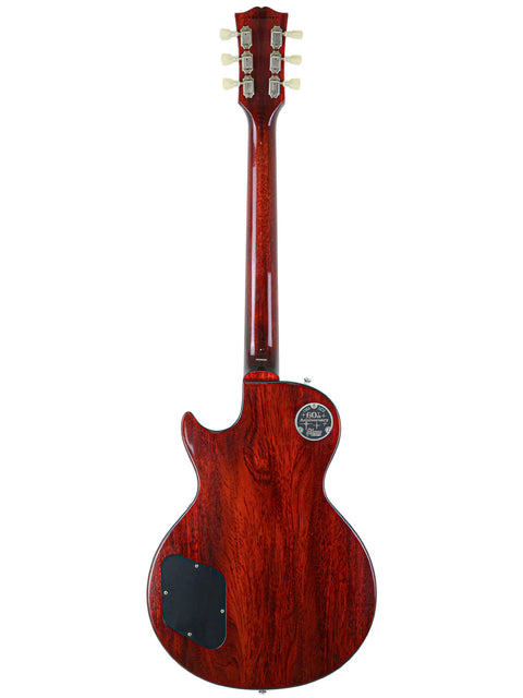 Red guitar featuring a wooden body and neck, representing the 60th Anniversary 1960 Les Paul Standard from Gibson Custom Shop.