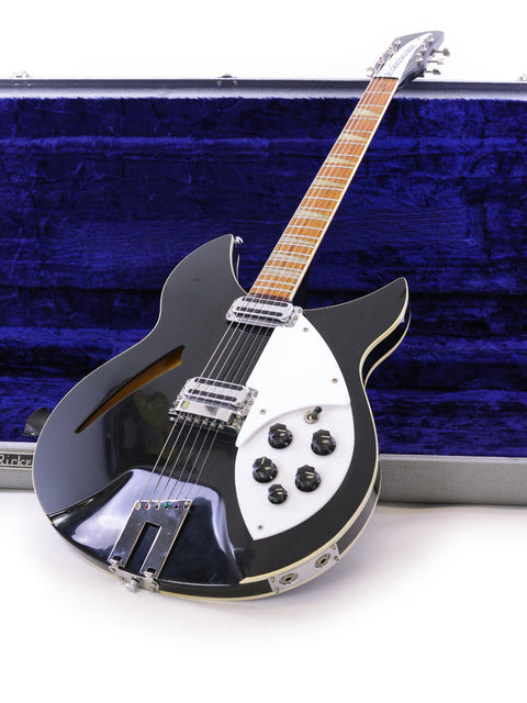 Rickenbacker 360 WB electric guitar in black and white, 1996 USA edition, securely housed in a case.