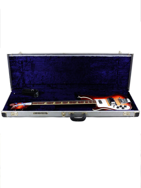 Rickenbacker 4003 Fireglo bass guitar in its case, displayed on a white background.