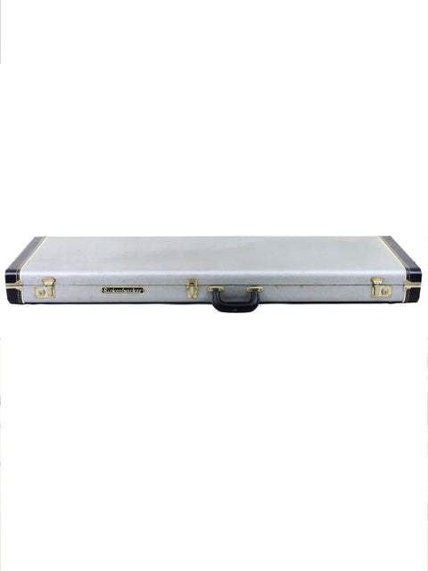 Silver case with gold hardware, featuring the Rickenbacker 4003 Fireglo Bass LH from 1997 on a clean white backdrop.
