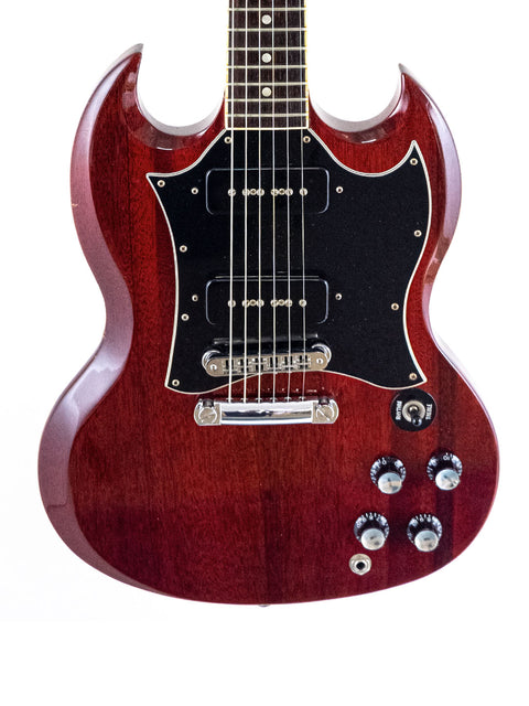 Stunning red Gibson SG Classic electric guitar with a sleek black pickguard, perfect for musicians seeking quality and style.
