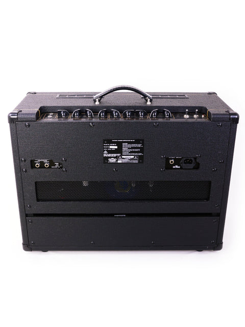 Stylish black Vox AC15 C1X combo amp with a large speaker cabinet, designed for impressive audio performance.