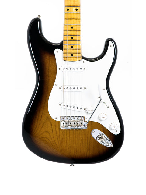 Sunburst electric guitar with a maple neck isolated on a white background.