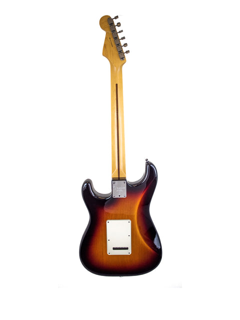 Sunburst electric guitar with a maple neck on a white background.