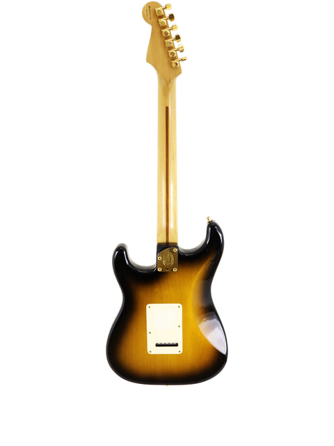 Sunburst electric guitar with a single pickup and maple neck on a white background.