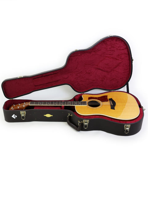 Taylor 410CE guitar case in red and black, highlighting its stylish exterior and quality from the USA, made in 2011.