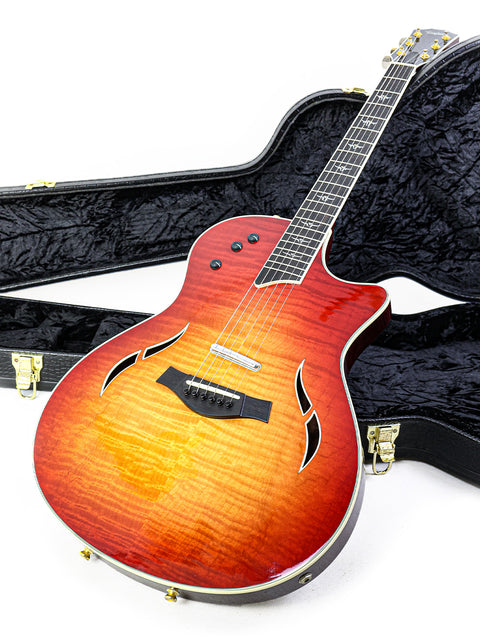Taylor 812ce sunburst electric guitar, T5-C1 model, USA-made in 2010, featuring a rich sunburst color and elegant shape.