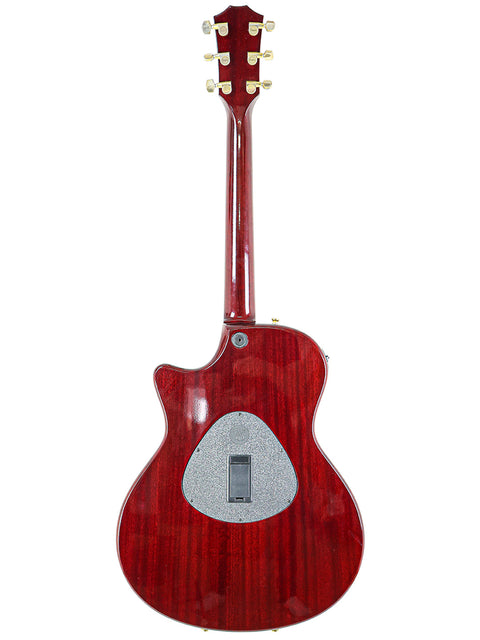 Taylor T5-C1 guitar in red, displayed on a white background, highlighting its elegant shape and craftsmanship.