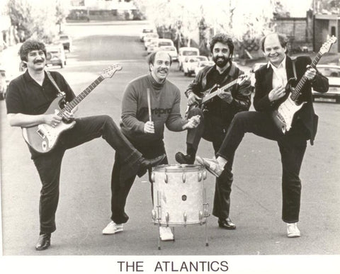 The Atlantic band with two guys and a girl, highlighting a vintage 1964 Fender Stratocaster guitar.