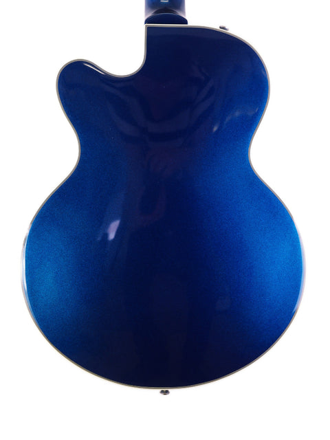 The Epiphone UpTown Kat ES guitar in blue stands out against a white background, highlighting its elegant shape and finish.