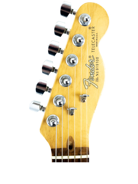 The Fender American Standard Stratocaster, featuring a classic body shape and rich color, ideal for rock and blues styles.