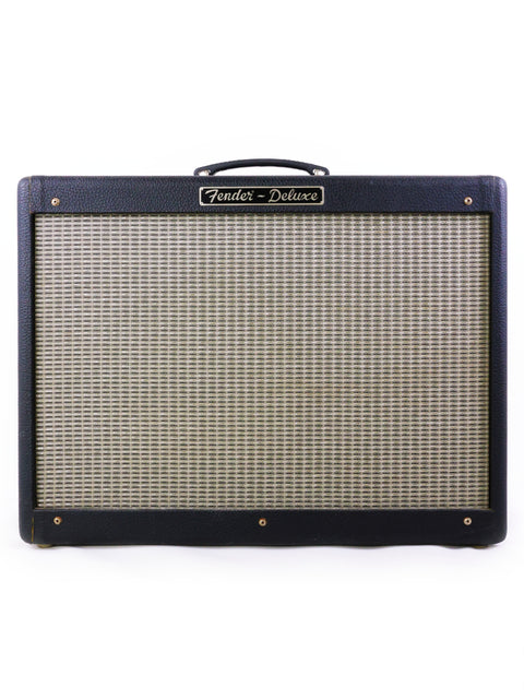 The Fender Hot Rod Deluxe Combo Amp, USA 2000 model, prominently featured against a white backdrop, highlighting its features.
