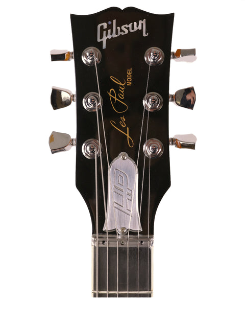 The Gibson Les Paul HP electric guitar from 2019, featuring P-90 pickups, known for its rich sound and elegant style.
