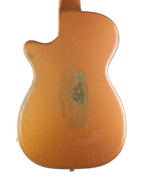 The Harmony H44 Stratotone from 1955 showcases a stunning gold finish paired with a unique green paint design.