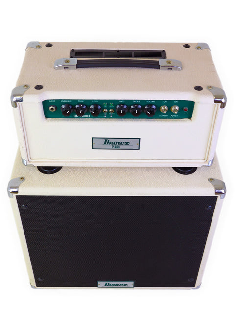 The Ibanez TSA15 amplifier features a white and green design with a green cover, perfect for music enthusiasts and performers.
