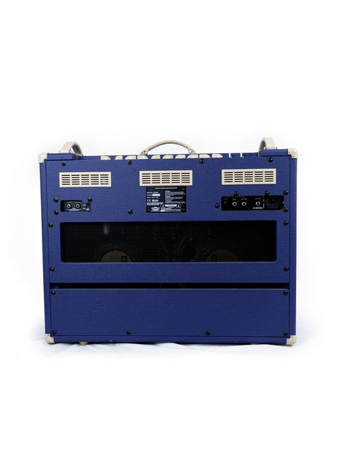 The Vox AC 30 C2 Limited Edition amplifier in blue, set against a stark white background, highlighting its unique style.