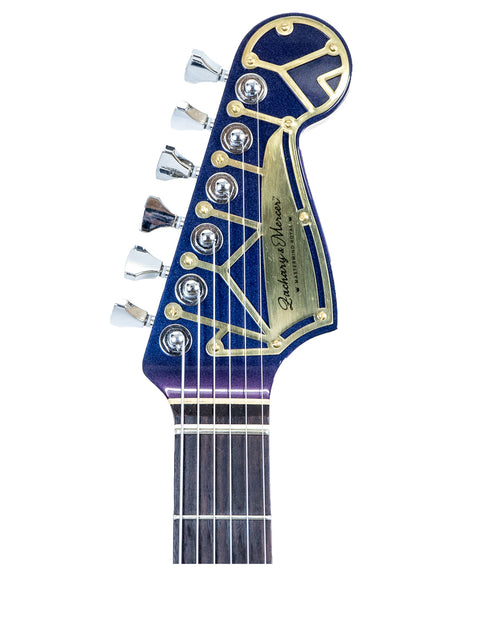 The Zachary & Mercer Mastermind “Royal” Offset guitar features a striking blue and gold headstock, made in Australia, 2021.