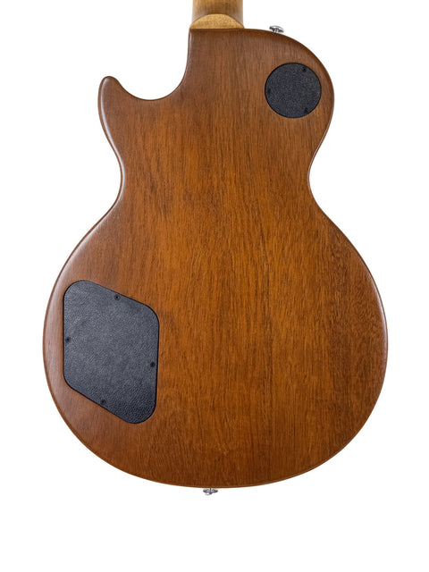 The back of a 2019 Gibson Les Paul Tribute electric guitar, featuring a beautifully crafted wooden body.
