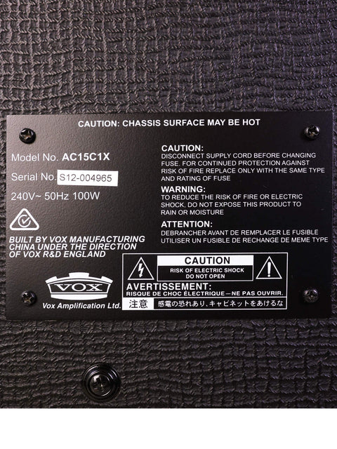 The back of a 2021 Vox AC15 C1X Combo Amplifier showing a black sticker on the speaker.