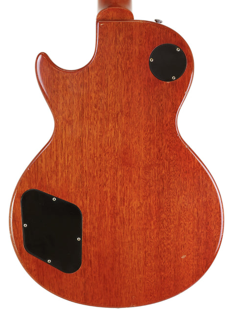 The back of a Gibson Custom Shop '58 Les Paul Standard, featuring a stunning wooden body and aged details from 2008.