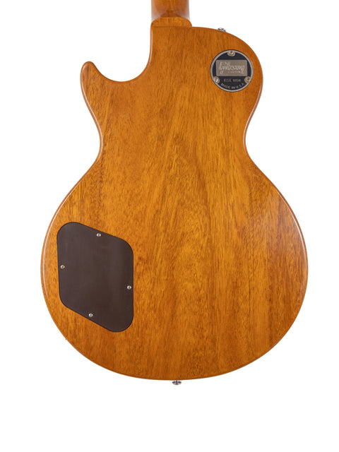 The back of a Gibson Custom Shop LPR-7 1957 Les Paul Goldtop Reissue, highlighting its rich wooden texture and craftsmanship.