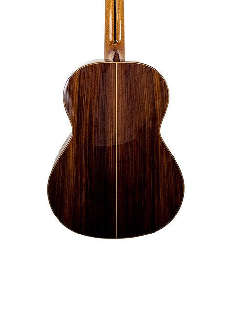 The back of an Alhambra C-Series ORO Classical Guitar, featuring a beautifully crafted wooden back, made in Spain in 2005.