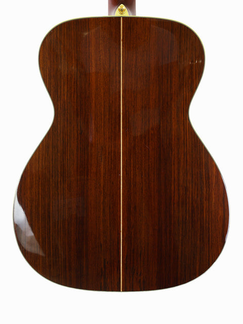The back of an Alvarez Yairi FYM95V acoustic guitar, featuring a beautifully crafted wooden back, made in Japan in 2008.