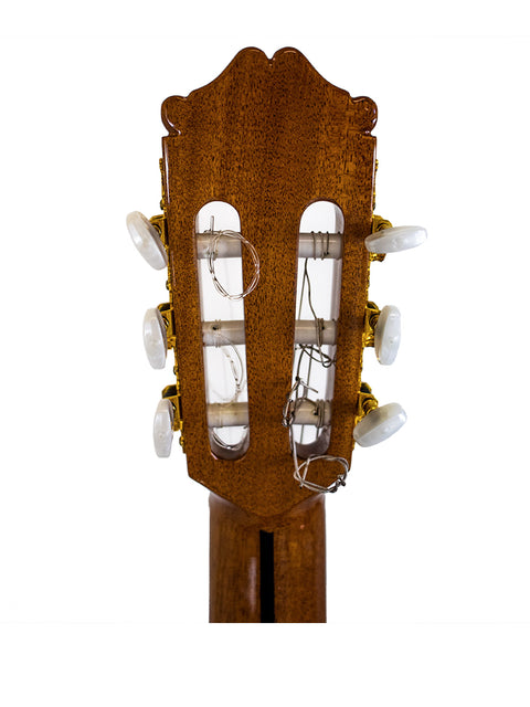The headstock of a 2005 Alhambra C-Series ORO Classical Guitar displayed on a bright white background.
