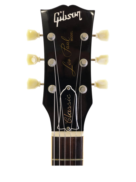 The image features a Gibson Les Paul Custom Jr, highlighting its iconic shape and vintage charm from the 1991 USA 1960 Reissue.