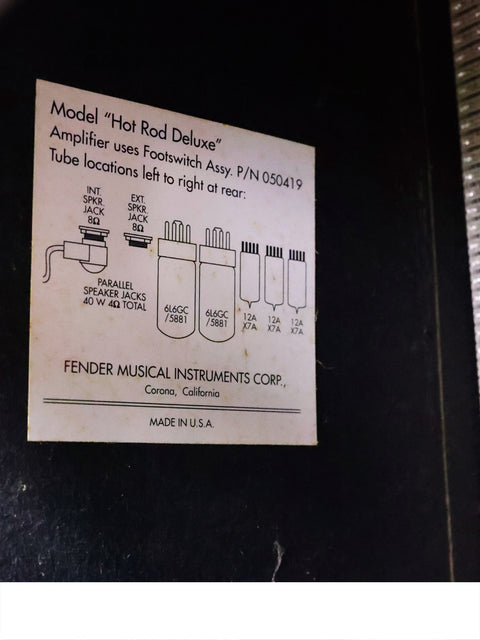 The image features a black box label stating "Model - R - Rodel," linked to a 2000 Fender Hot Rod Deluxe Combo Amp.