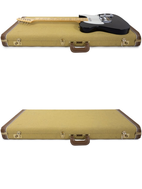 The image shows a black and white guitar on a Fender Custom Shop case, representing the 30th Anniversary ’51 Nocaster NOS.