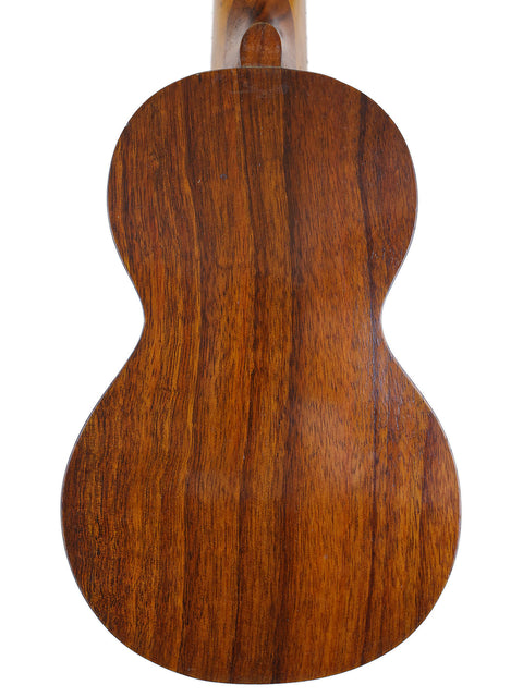 The wooden back of a Kaai Style 2 Koa Ukulele, Hawaii, c. 1918, highlighting its craftsmanship and vintage design.