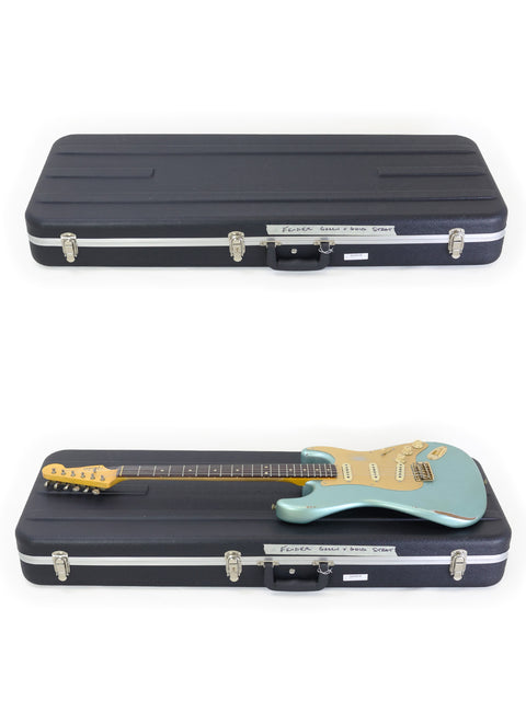 Two cases for a green electric guitar, featuring the Fender Custom Shop Ltd Poblano Partscaster from 2020, USA.