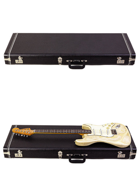 Two guitars, featuring a 1968 Fender Stratocaster, elegantly arranged in a case with a white background.
