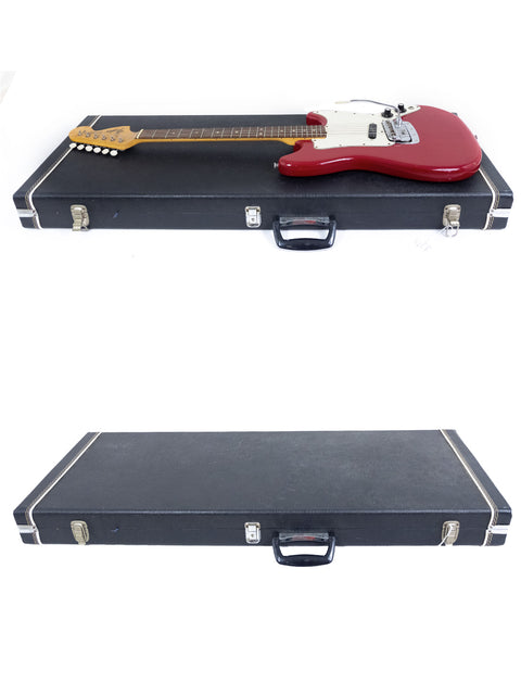 Two guitars, featuring a 1976 Fender Bronco, arranged in a case with a white backdrop.