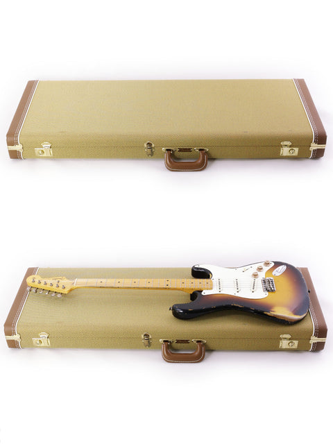 Two guitars in a case against a white background, featuring the Fender Jason Smith Masterbuilt Stratocaster '57 Reissue - USA 2015.