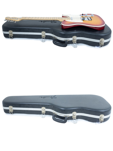 Two guitars in different cases, including a 2007 Fender American Deluxe Telecaster made in the USA.