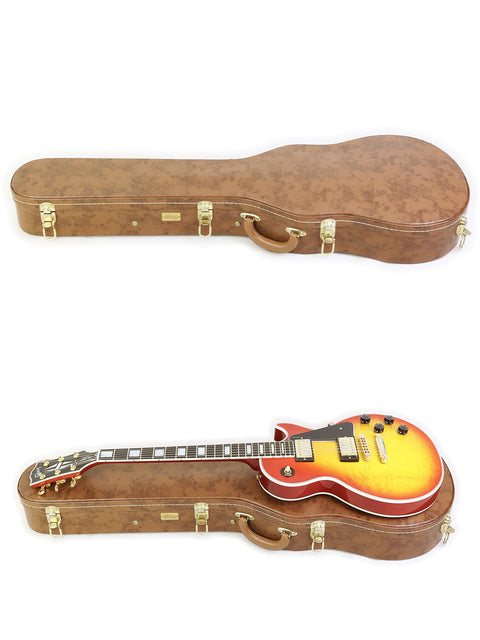 Two guitars in matching cases, featuring a 2014 Gibson Custom Shop Les Paul Custom, both in the same color.