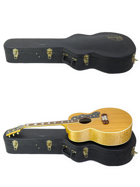 Two guitars, including a Gibson SJ-200 from 2001, resting in their cases on a clean white background.