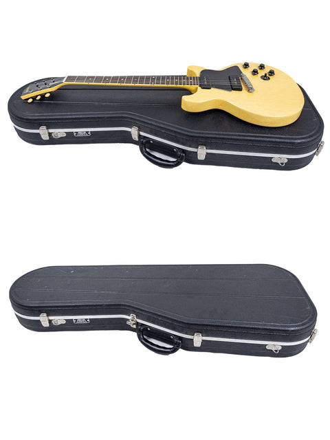 Two guitars nestled in a case, showcasing a yellow-bodied vintage Gibson Les Paul Special from 1958.