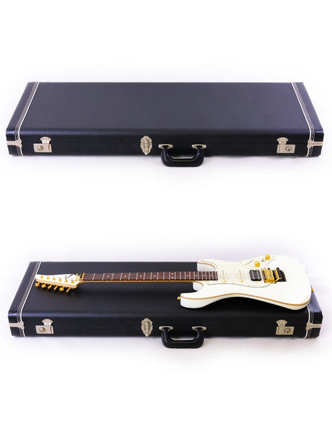 Two white electric guitars, Tom Anderson Drop Top Classic – USA 2014, displayed in a case against a white backdrop.