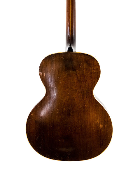 Vintage 1930 Gibson J-45 electric guitar, showcasing classic design and craftsmanship, alongside a 1935 Epiphone Masterbilt Zenith.