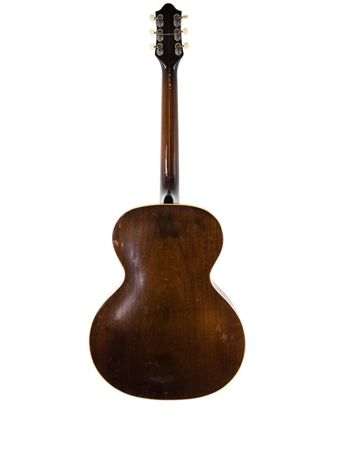 Vintage 1951 Gibson J-45 electric guitar displayed alongside a 1935 Epiphone Masterbilt Zenith, showcasing classic craftsmanship.