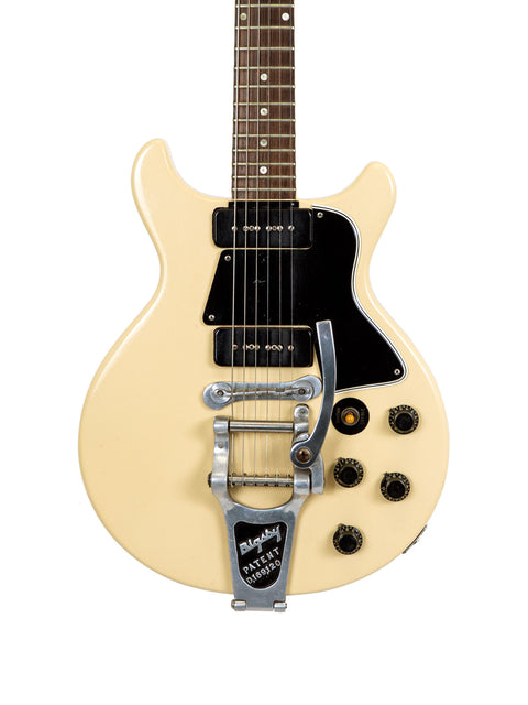 Vintage 1959 Gibson Les Paul Special Refin, a white electric guitar with a striking black pick guard, perfect for music lovers.