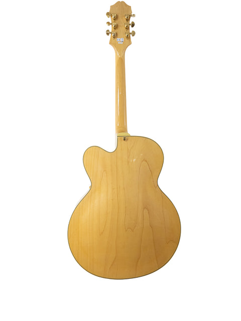 Vintage 1965 Epiphone Coronet guitar with a beautifully crafted wooden body and neck, highlighting its classic appeal.