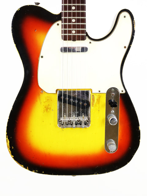 Vintage 1966 Fender Telecaster guitar with a sunburst finish, showcasing its classic design and craftsmanship.