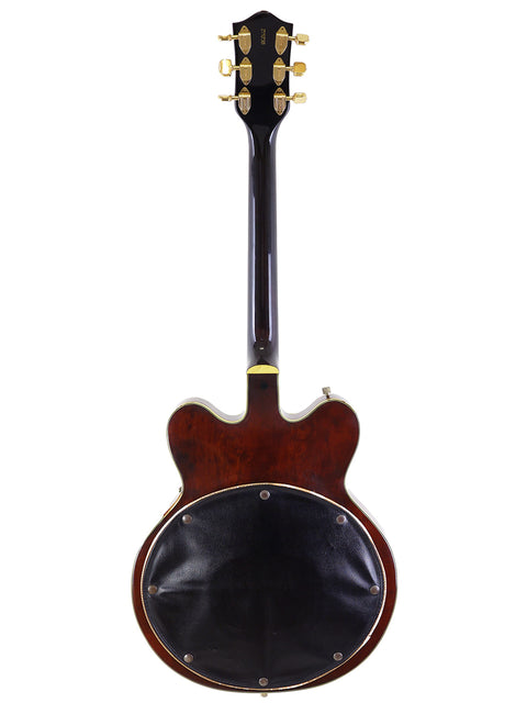 Vintage 1967 Gretsch 6122 Chet Atkins guitar with a striking black back and rich brown body.