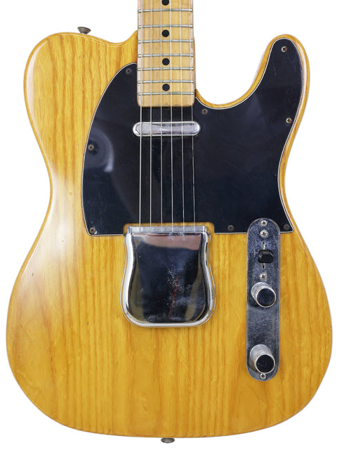 Vintage 1977-78 Fender Telecaster guitar in yellow with a black pickup, showcasing classic design and vibrant color.